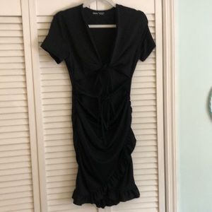 Black Dress, Short Sleeve, Ruffle Bottom. Open Front. Two Ties In Front. Size L